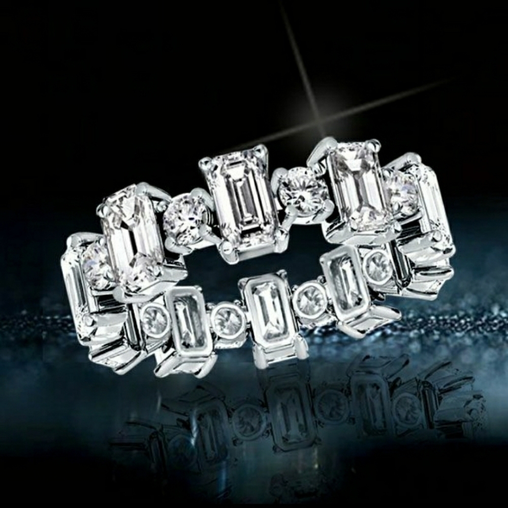3.5 ct Emerald & Round Eternity Diamond